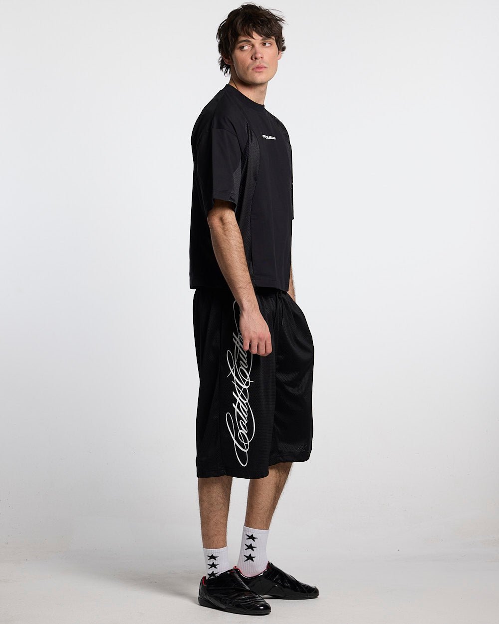 RIOT MESH SHORT BLACK - black mesh shorts, side view - Cold Culture #man