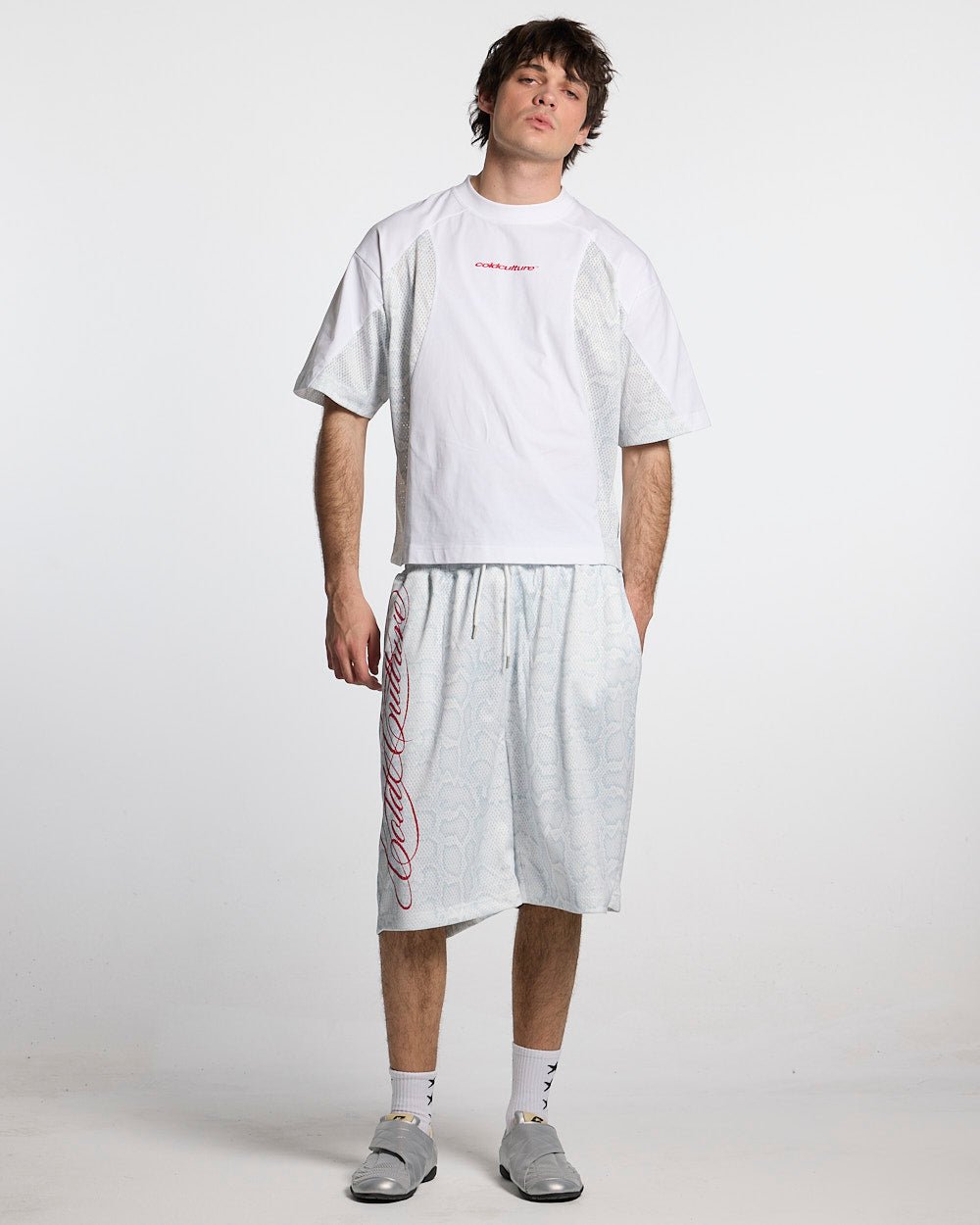 RIOT MESH SHORT WHITE - white snake print mesh shorts, front view on male model - Cold Culture #man