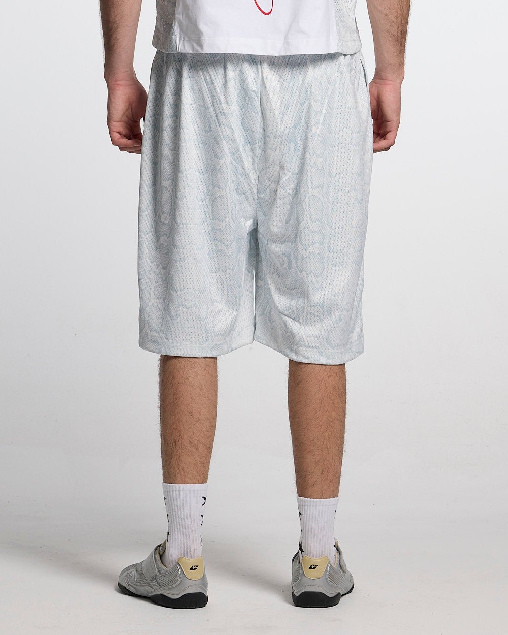RIOT MESH SHORT WHITE - white snake print mesh shorts, front view on male model - Cold Culture