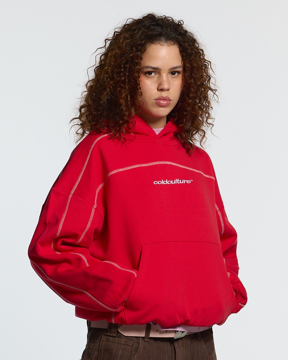 ROLLER HOODIE RED - red contrast stitch hoodie, front view on female model - Cold Culture #woman