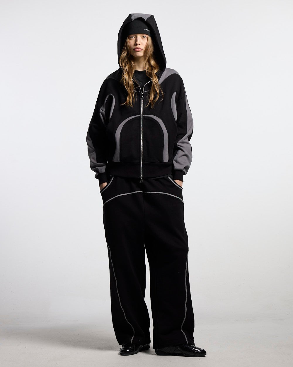 ROLLER SWEATPANTS BLACK - black contrast stitch sweatpants, front view on female model - Cold Culture #woman