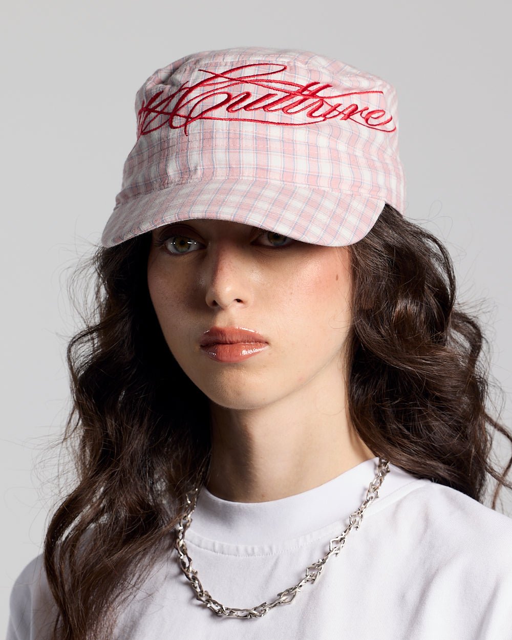 SCRIPT CAP PINK - pink plaid cap, on model close-up - Cold Culture #woman