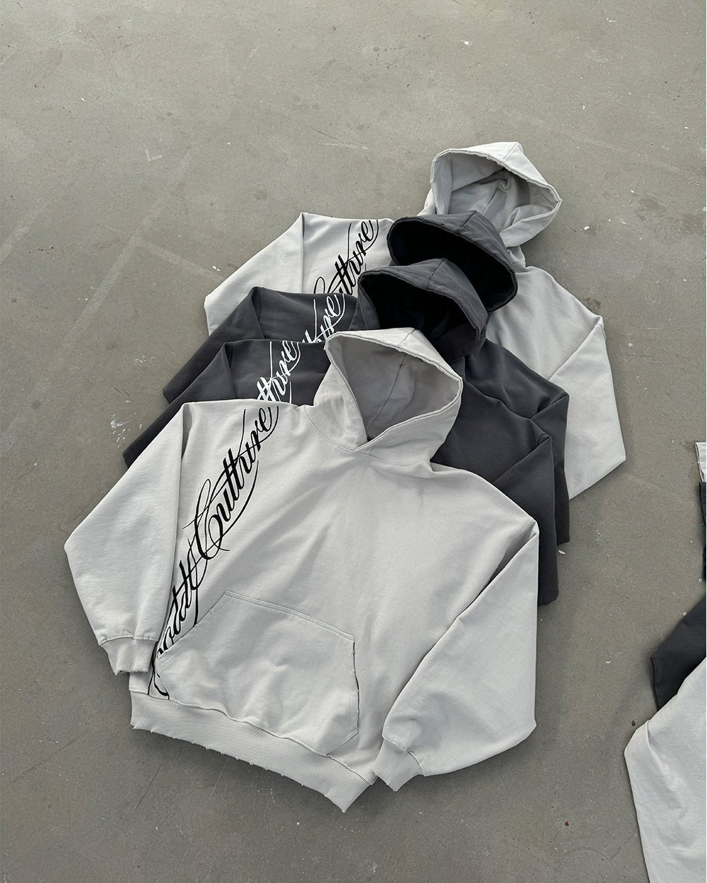 SCRIPT HOODIE ANTRACITE GREY - grey script print hoodie, flat lay with matching pieces - Cold Culture