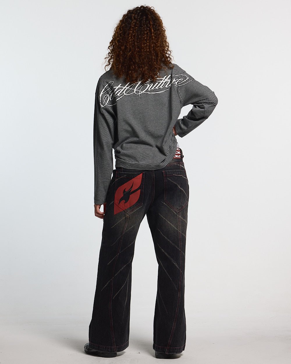 SCRIPT STRIPES LONGSLEEVE BLACK - black striped longsleeve tee, back view on female model - Cold Culture #woman