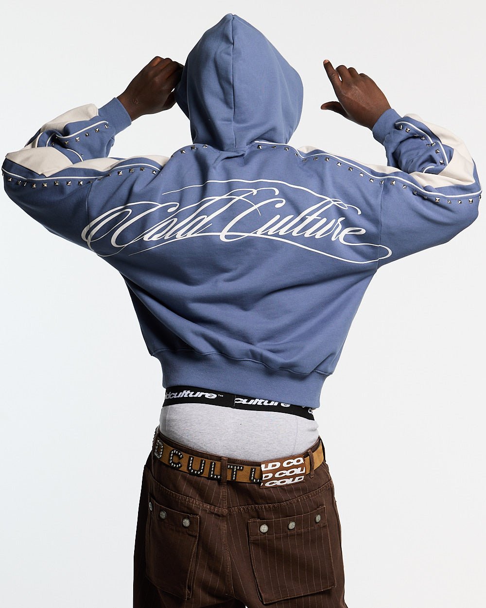 SCRIPT STUDS HOODIE BLUE - blue studded hoodie, back view on male model - Cold Culture