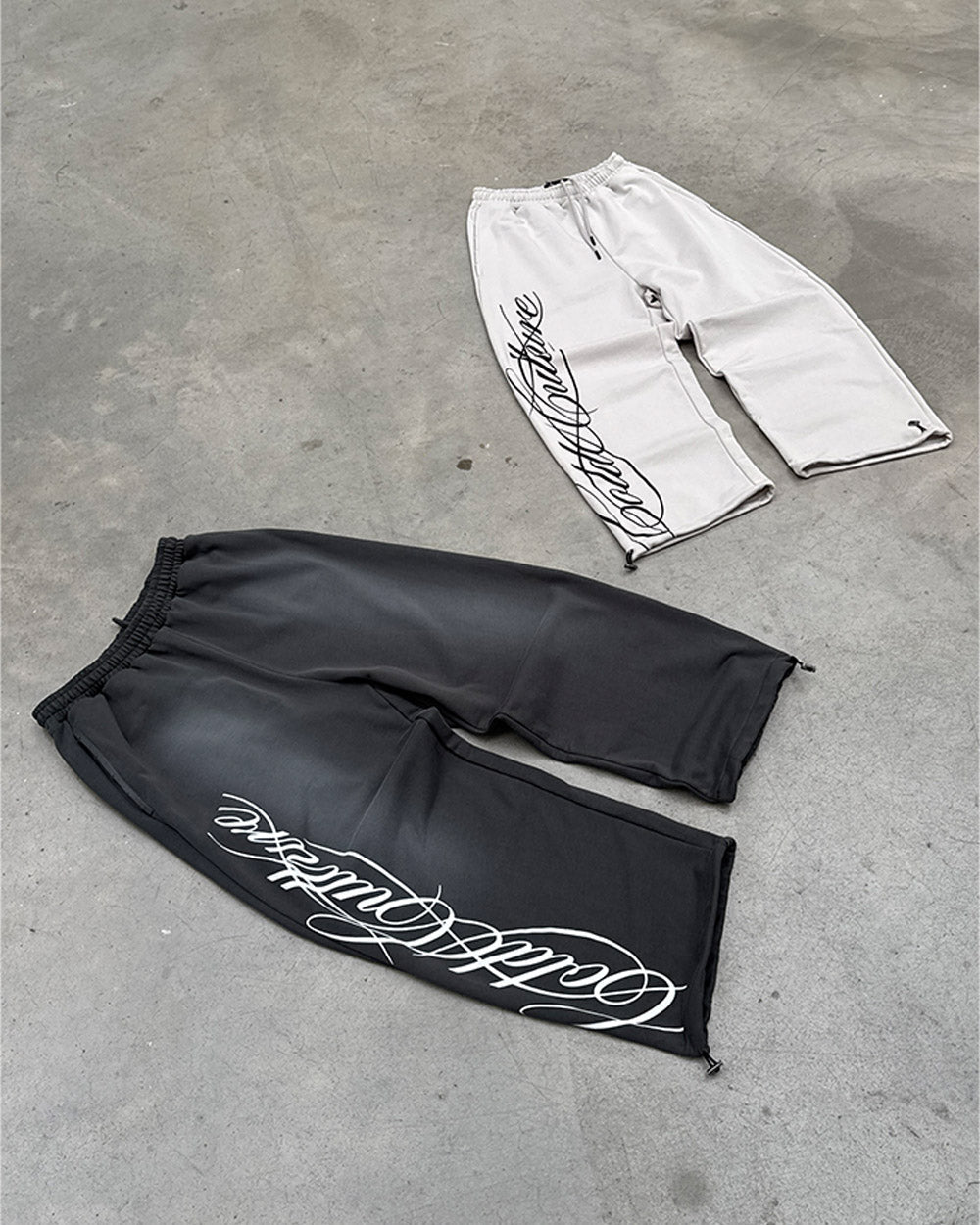 SCRIPT SWEATPANTS ANTRACITE GREY - dark grey script print sweatpants, flat lay with matching pieces - Cold Culture