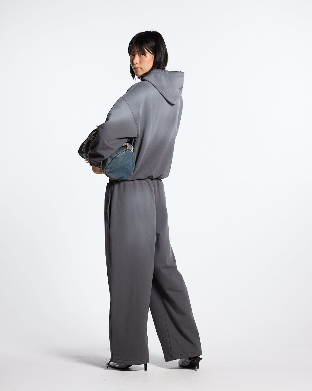 SCRIPT SWEATPANTS ANTRACITE GREY - dark grey script print sweatpants, back view on female model - Cold Culture #woman