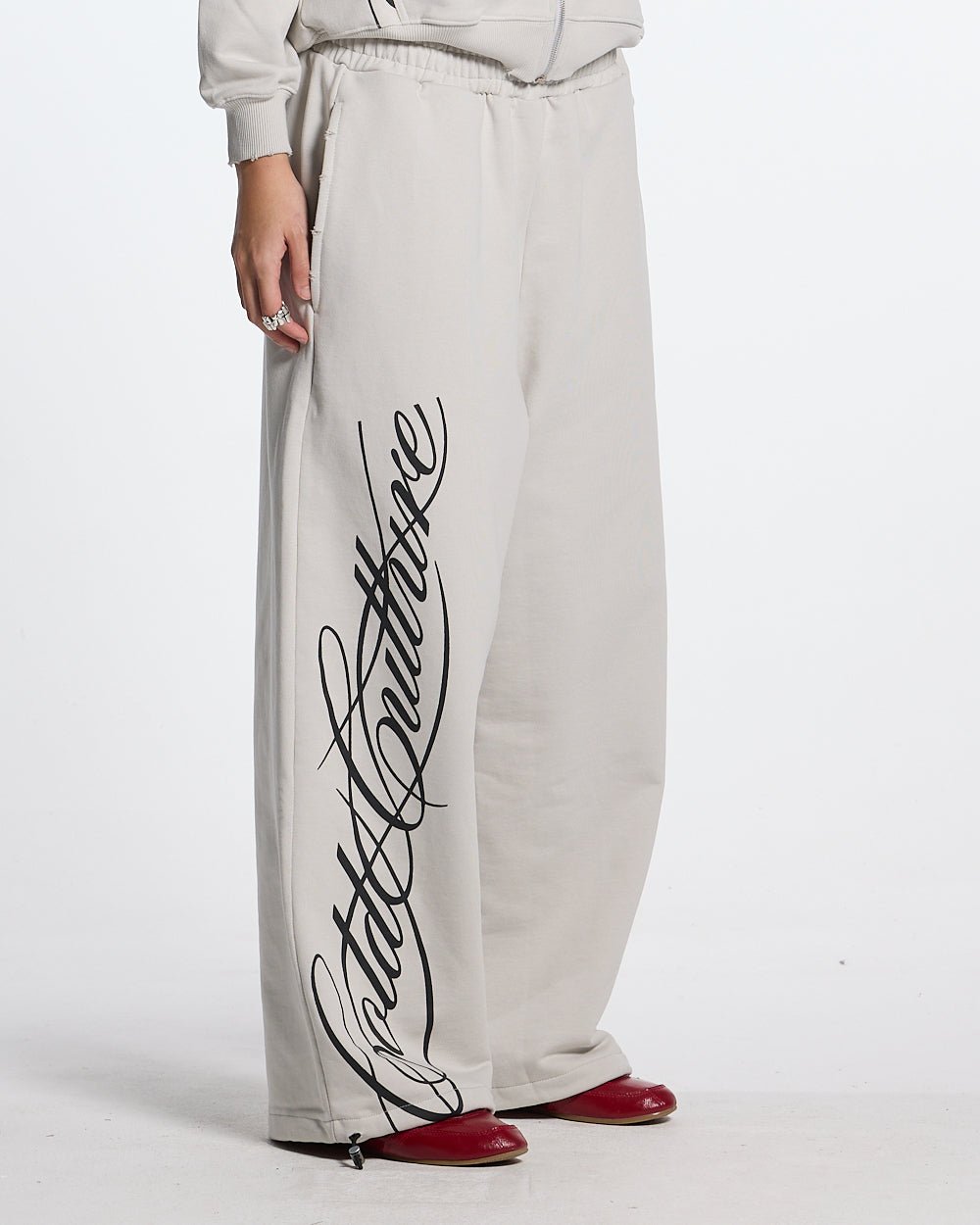 SCRIPT SWEATPANTS LIGHT GREY - light grey script print sweatpants, worn detail - Cold Culture