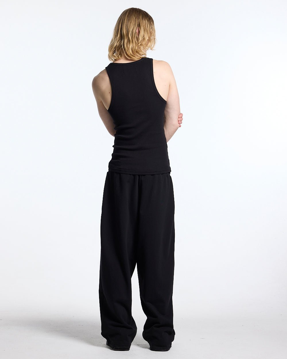 SCRIPT TANK TOP BLACK - black ribbed tank top, back view on male model - Cold Culture #man
