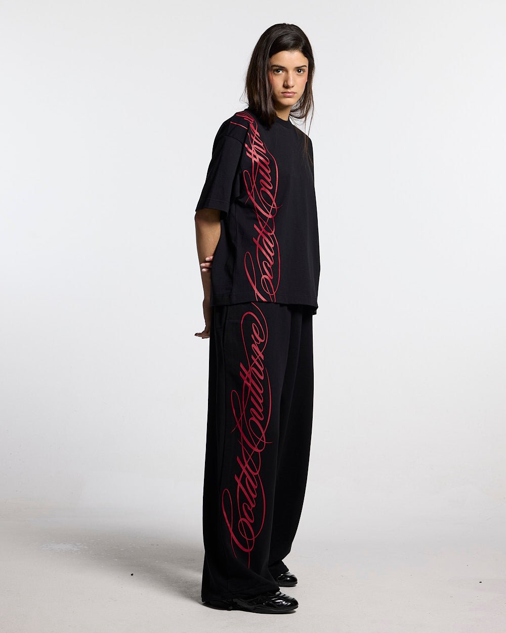 SCRIPT TEE BLACK - black script print tee, front view on female model - Cold Culture #woman
