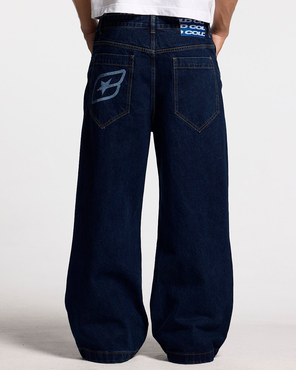 SCRIPT V3 PANTS RAW DENIM - dark blue baggy denim pants, back view on male model - Cold Culture