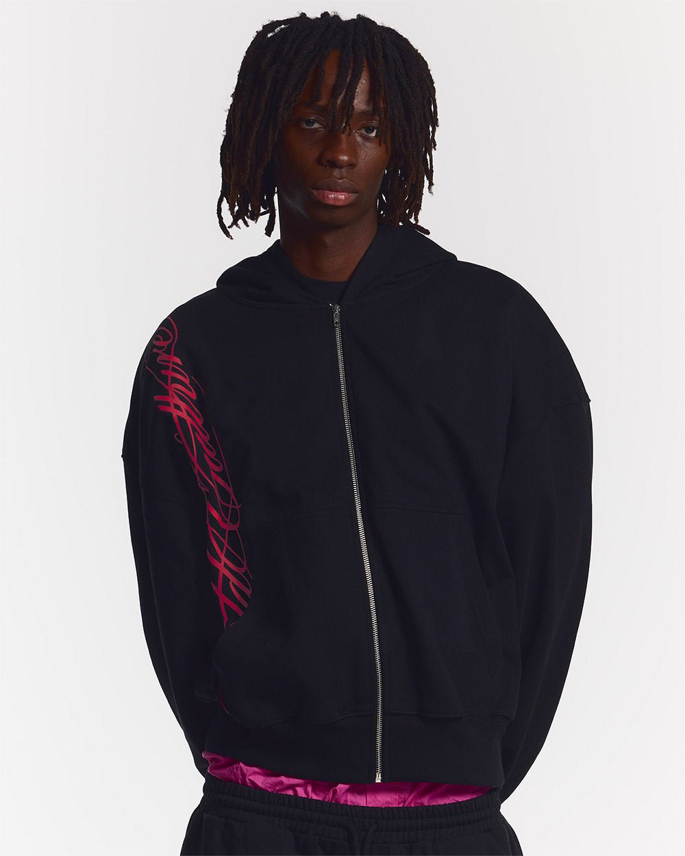 SCRIPT ZIP HOODIE BLACK - black graphic print zip-up hoodie, front view on male model - Cold Culture #man