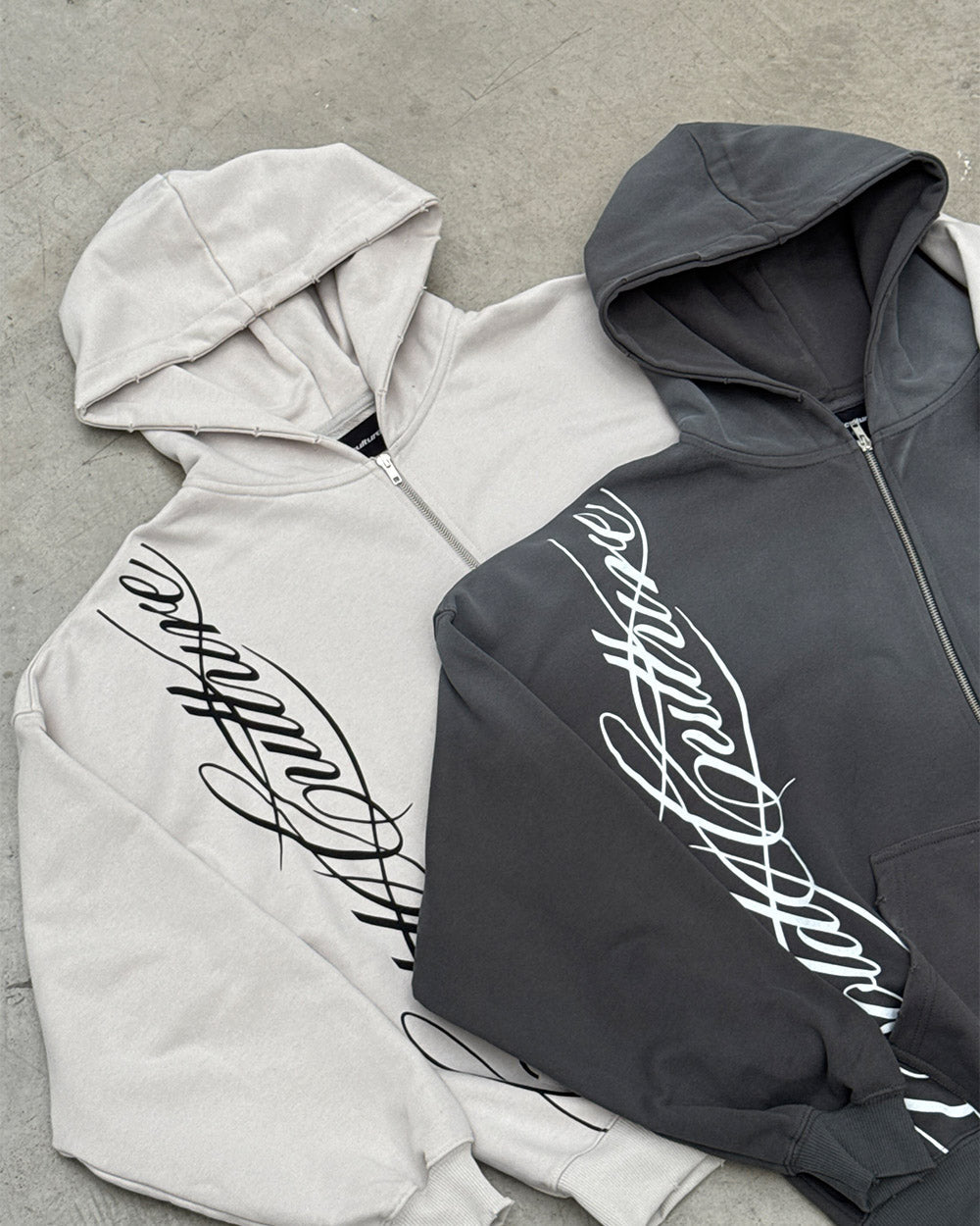 SCRIPT ZIP HOODIE LIGHT GREY - light grey script print zip hoodie, flat lay with matching pieces - Cold Culture