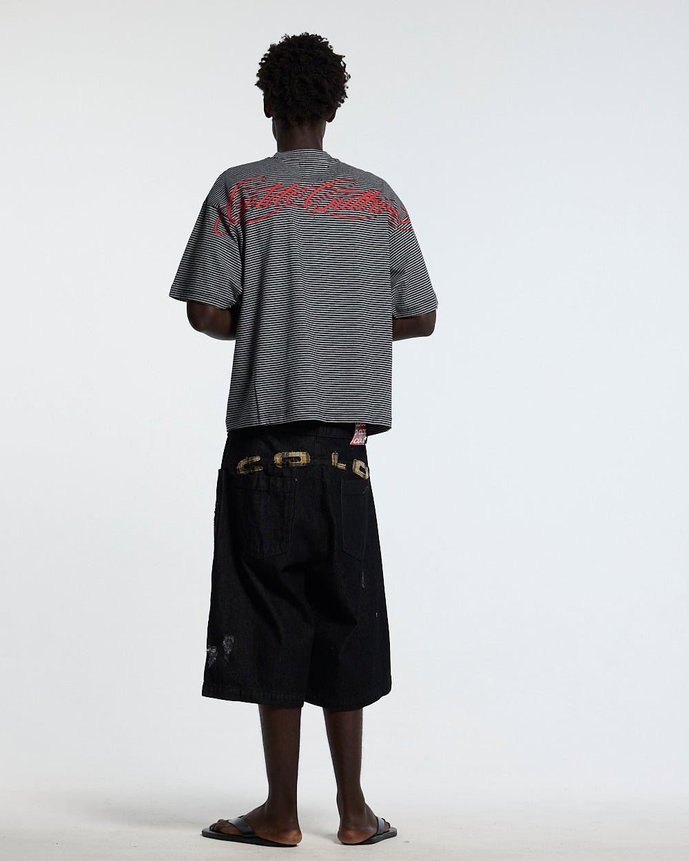 SCRIPTED STRIPES TEE BLACK - black striped tee, back view on male model - Cold Culture #man