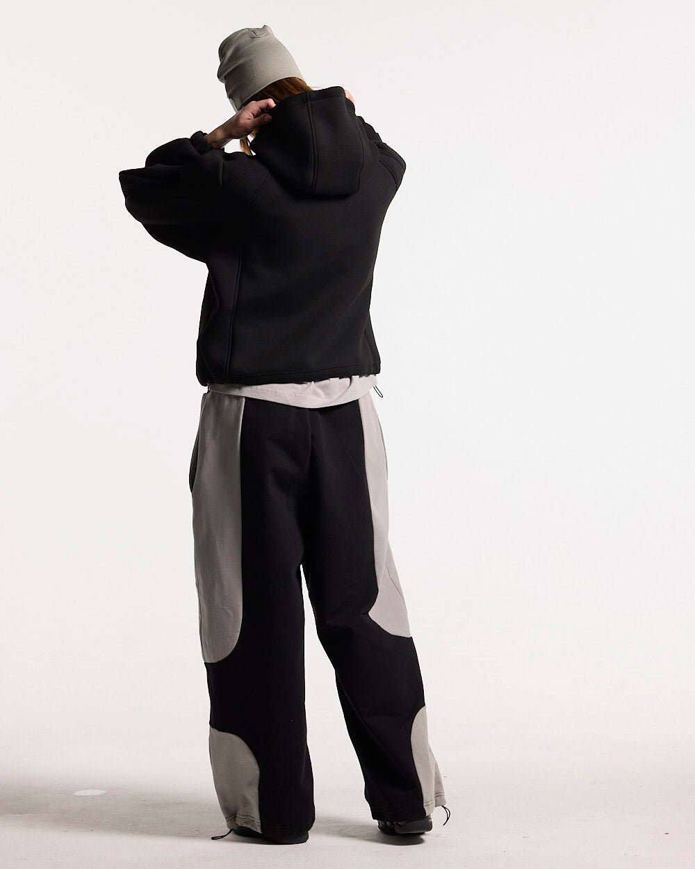 SCUBA ZIP HOODIE GREY & BLACK - black zip-up hoodie, back view on female model - Cold Culture #woman