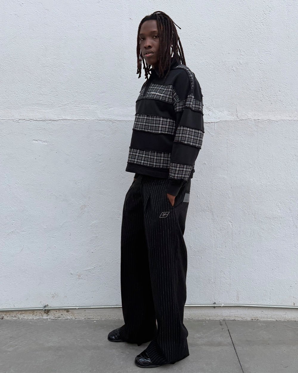 SEAM EFFECT LINE PANTS BLACK - black pinstripe pants, street style shot - Cold Culture #man