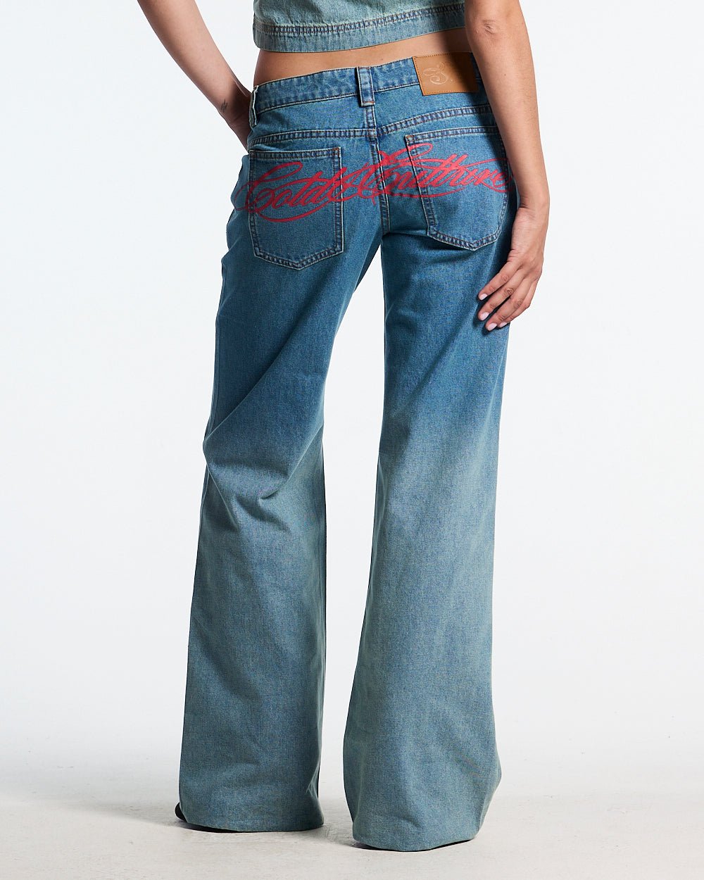 SIGHT BOOTCUT JEANS DENIM - blue washed bootcut jeans, back view on female model - Cold Culture #woman