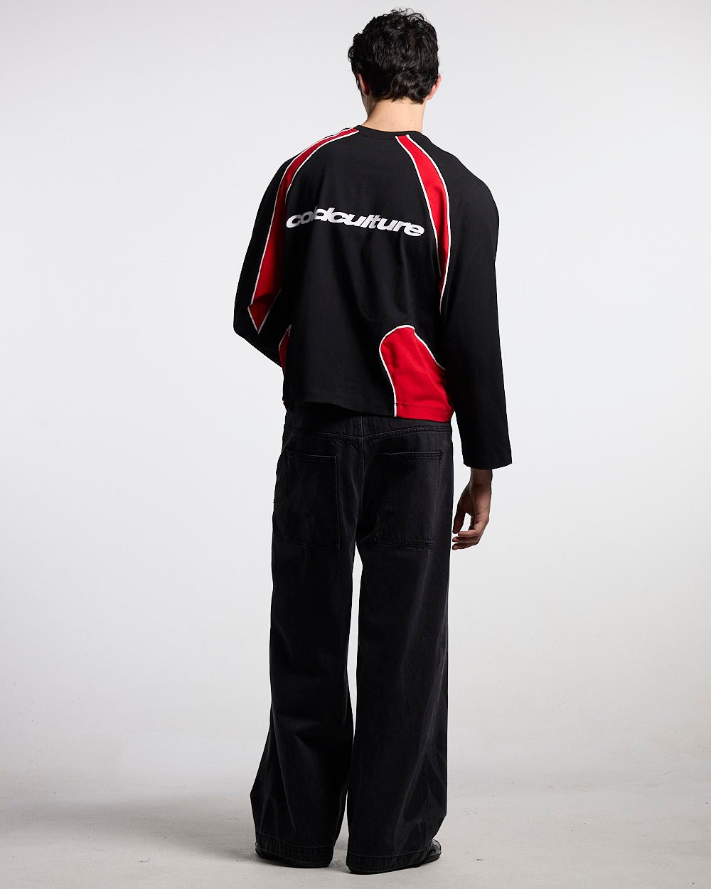 SLIDER LONGSLEEVE TEE BLACK & RED - black and red panelled longsleeve tee, back view on male model - Cold Culture #man