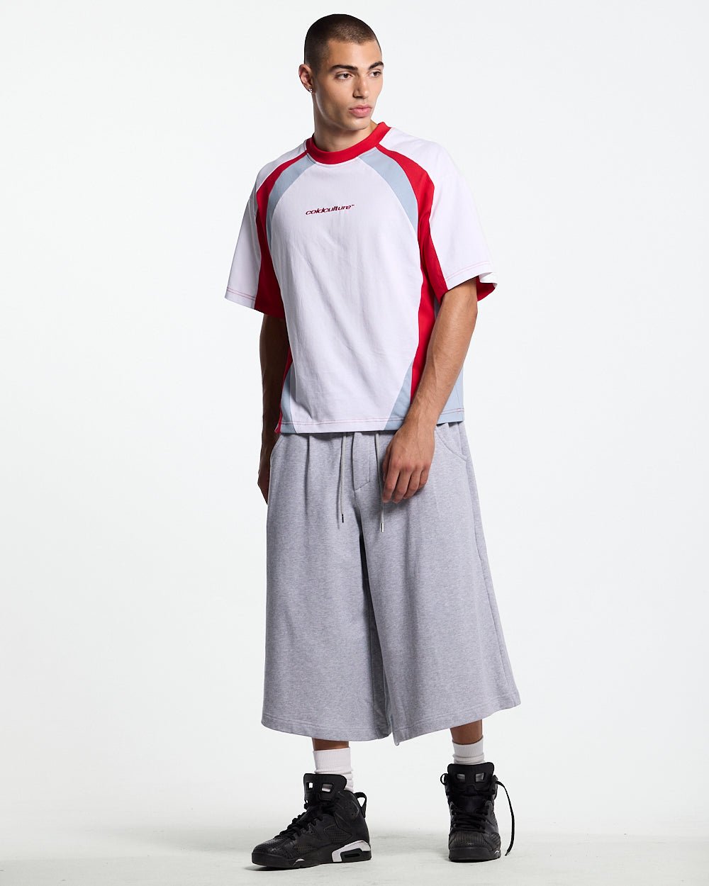 SNAPPED V2 JORTS HEATHER GREY - heather grey oversized sweat shorts, front view on male model - Cold Culture #man