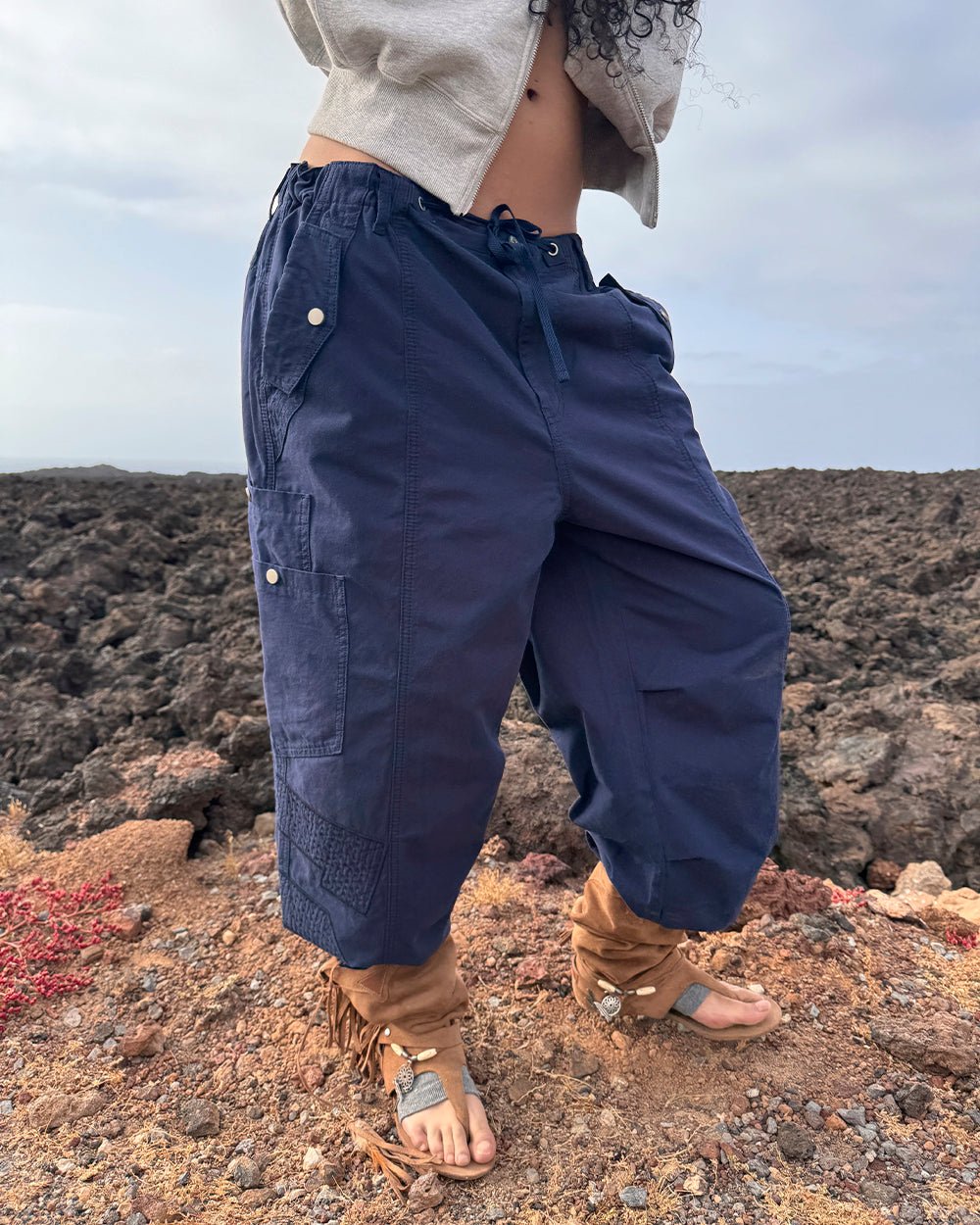 SOLID CARGO PANTS NAVY - navy cargo pants, street style shot - Cold Culture
