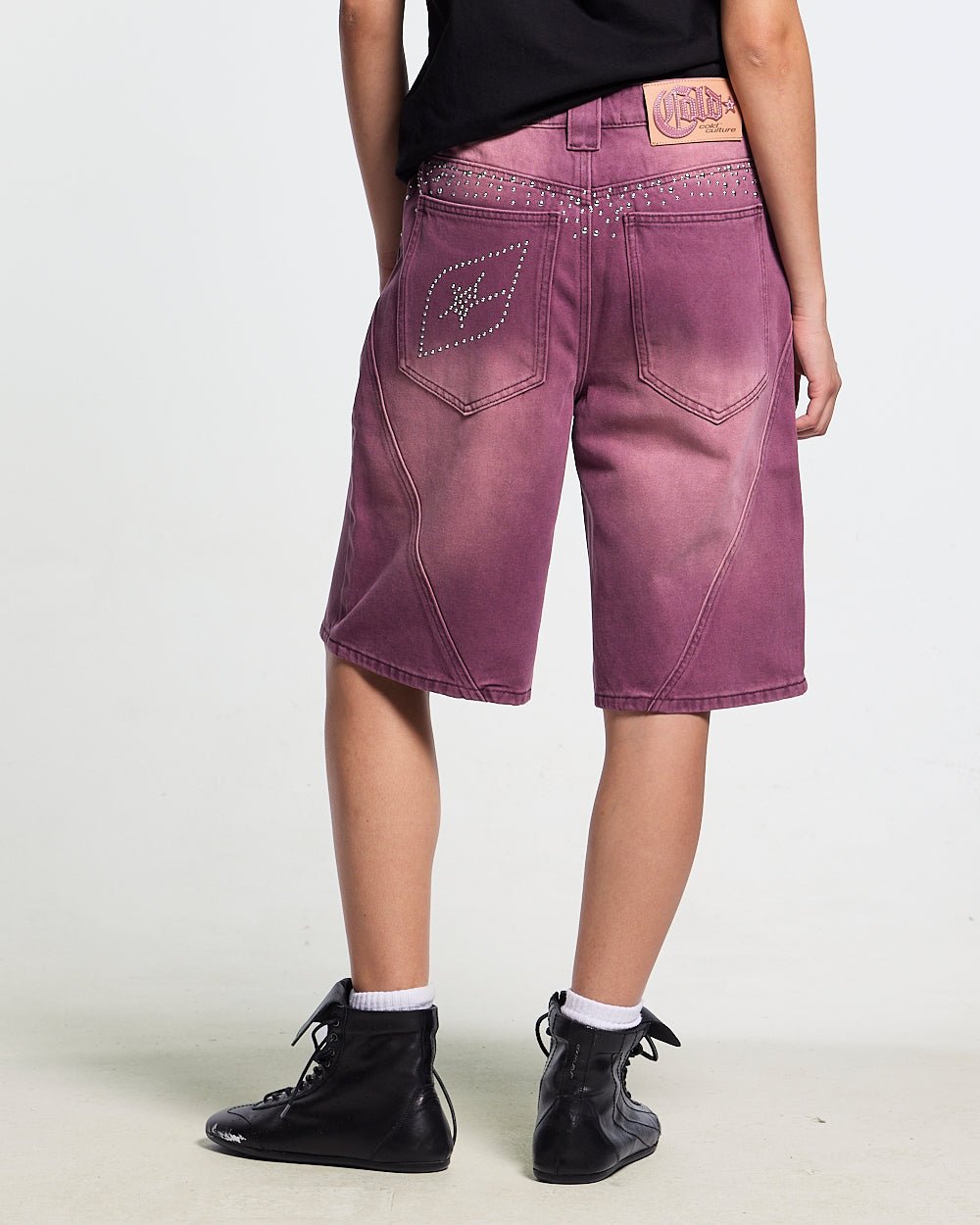 SPARK SHORTS BURGUNDY - washed burgundy denim shorts, back view on female model - Cold Culture #woman
