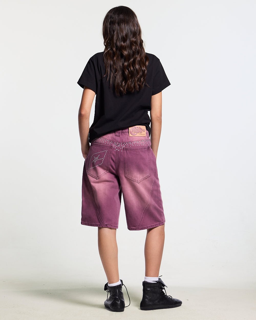 SPARK SHORTS BURGUNDY - washed burgundy denim shorts, back view on female model - Cold Culture #woman