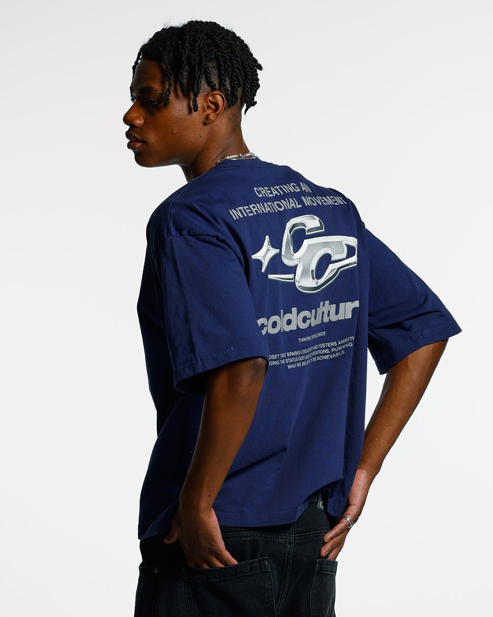 SPARKLY TEE COSMIC BLUE - navy blue graphic print tee, back view on male model - Cold Culture #man