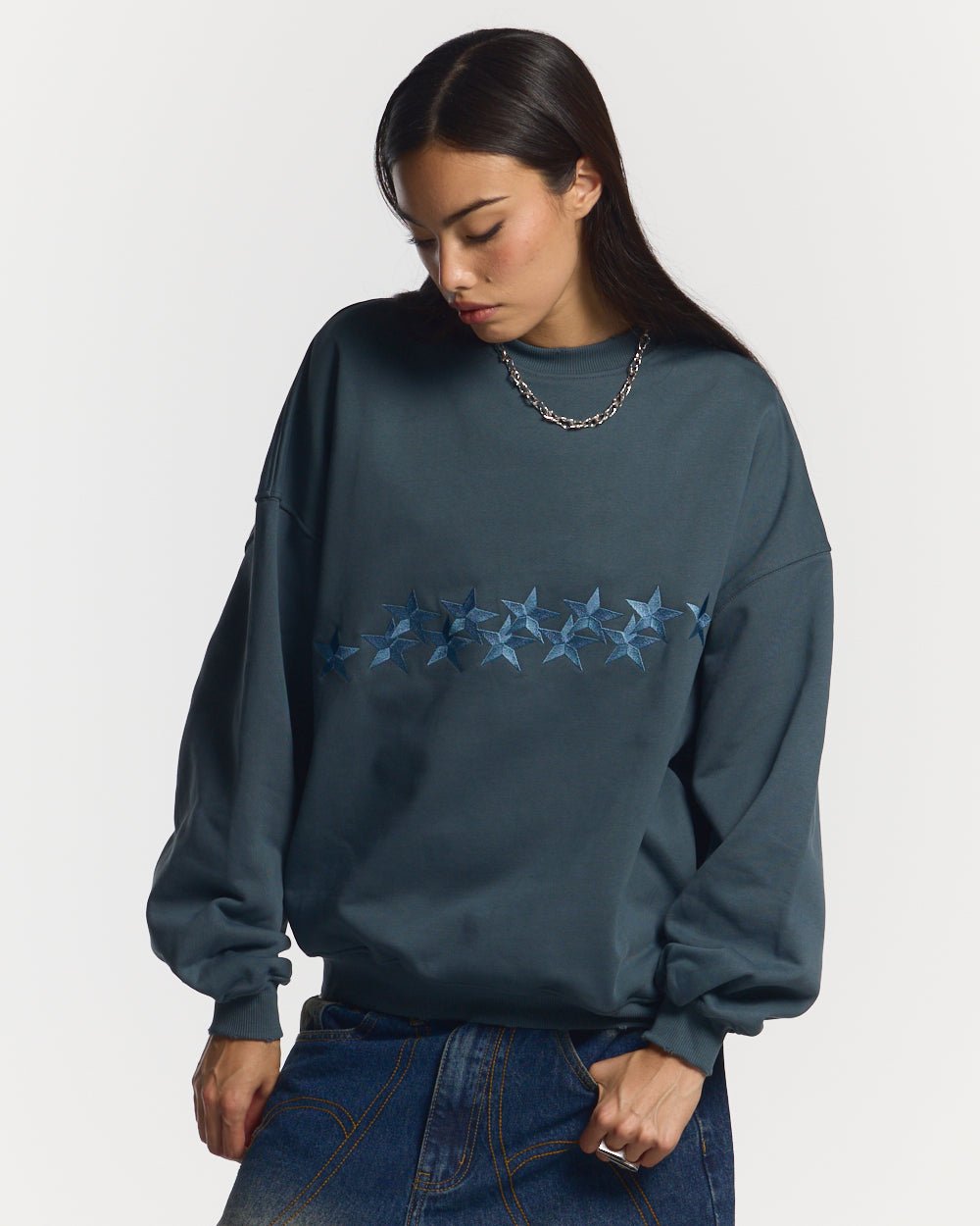 STARS CREWNECK SLATE BLUE - slate blue oversized crewneck sweatshirt, front view on female model - Cold Culture #woman