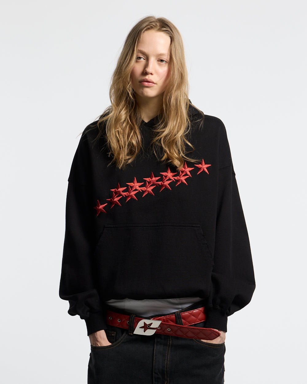 STARS HOODIE BLACK & RED - black hoodie with red stars, front view on female model - Cold Culture #woman