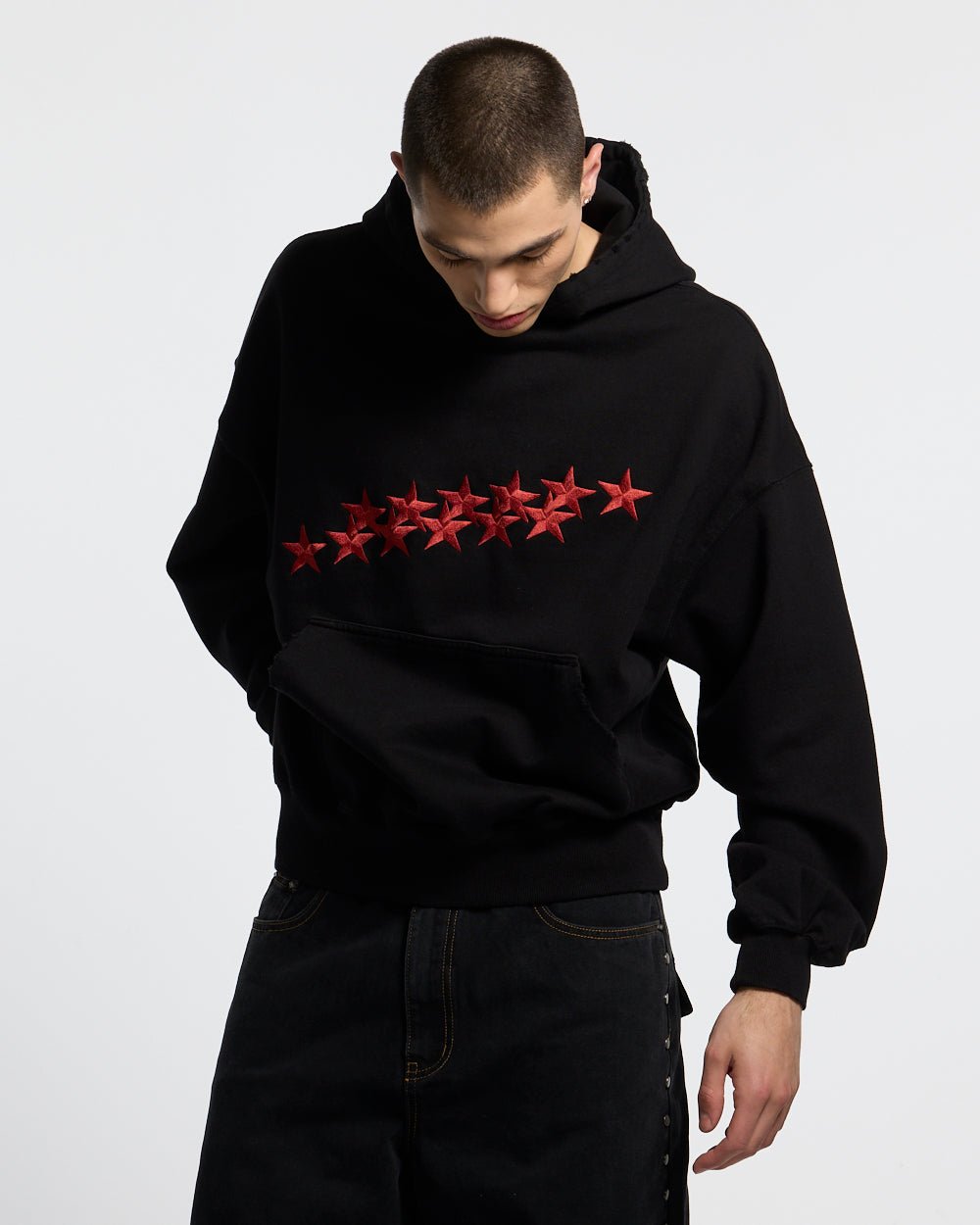 STARS HOODIE BLACK & RED - black hoodie with red stars, front view on male model - Cold Culture #man