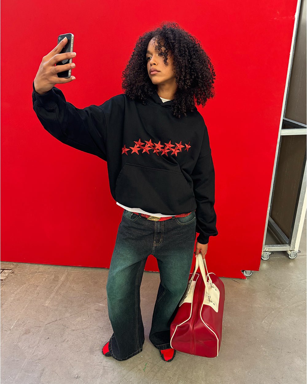 STARS HOODIE BLACK & RED - black hoodie with red stars, street style shot - Cold Culture #woman