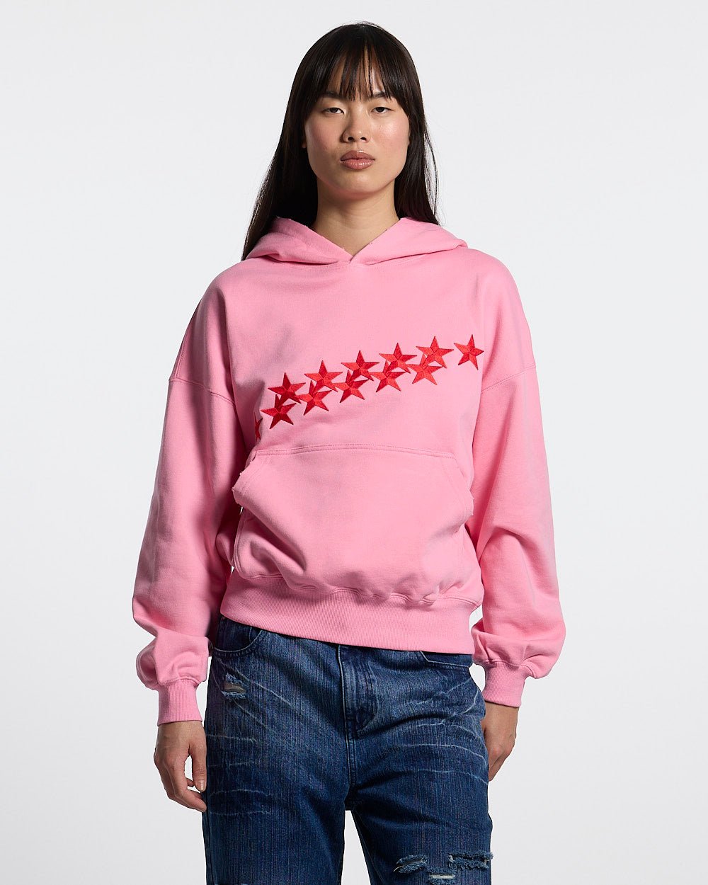 STARS HOODIE PANTHER PINK - pink oversized hoodie, front view on female model - Cold Culture #woman