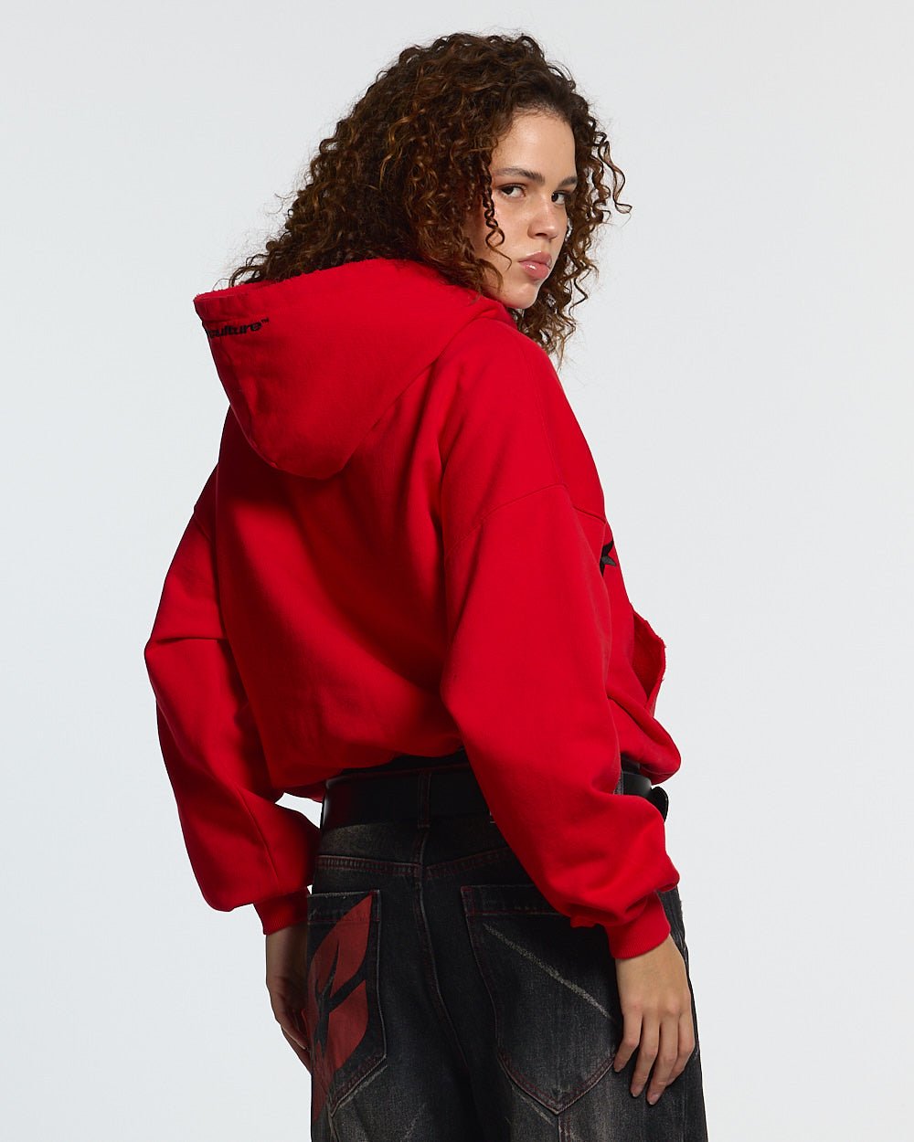 STARS HOODIE RED & BLACK - red star print hoodie, back view on female model - Cold Culture #woman
