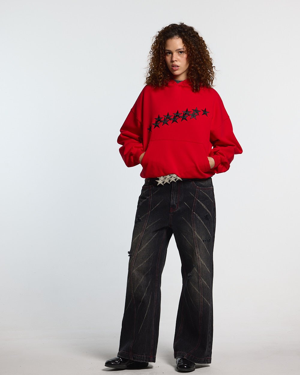 STARS HOODIE RED & BLACK - red star print hoodie, front view on female model - Cold Culture #woman