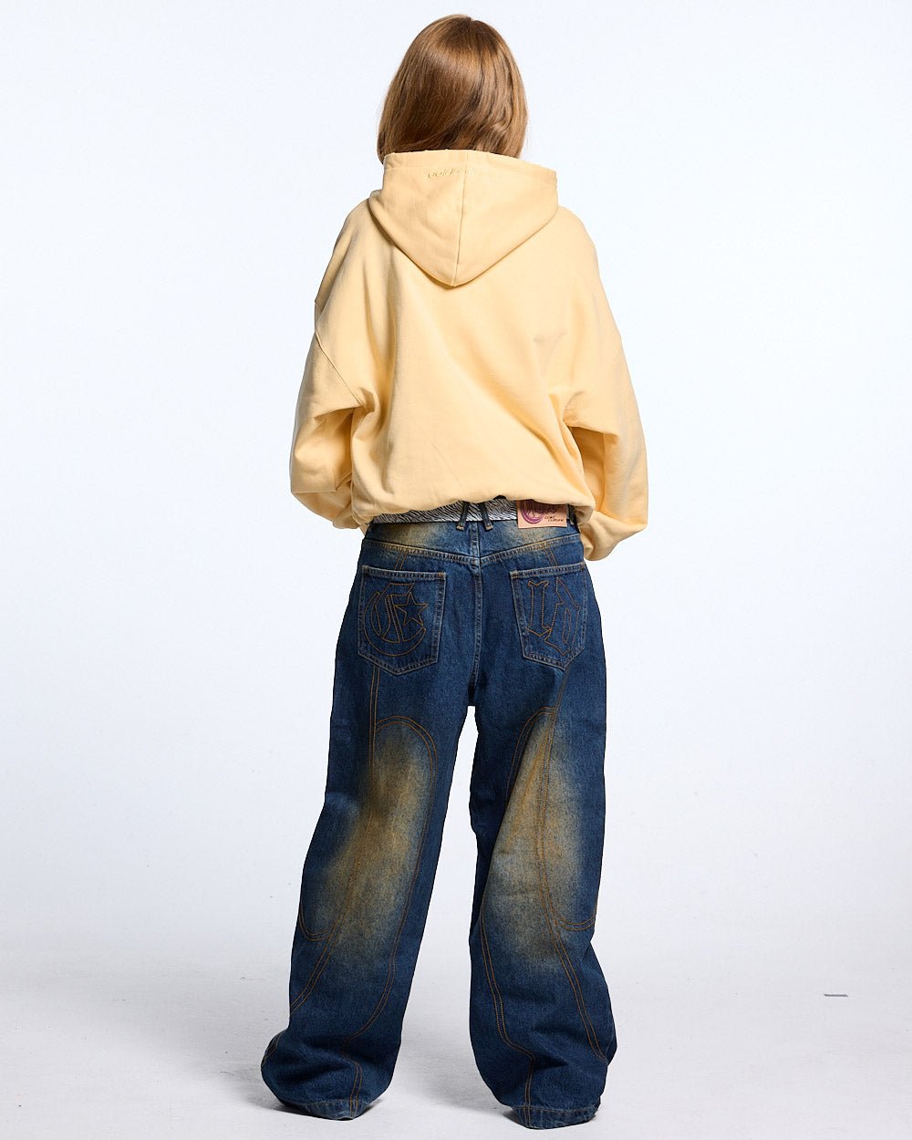 STARS HOODIE YELLOW - light yellow embroidered hoodie, back view on female model - Cold Culture #woman