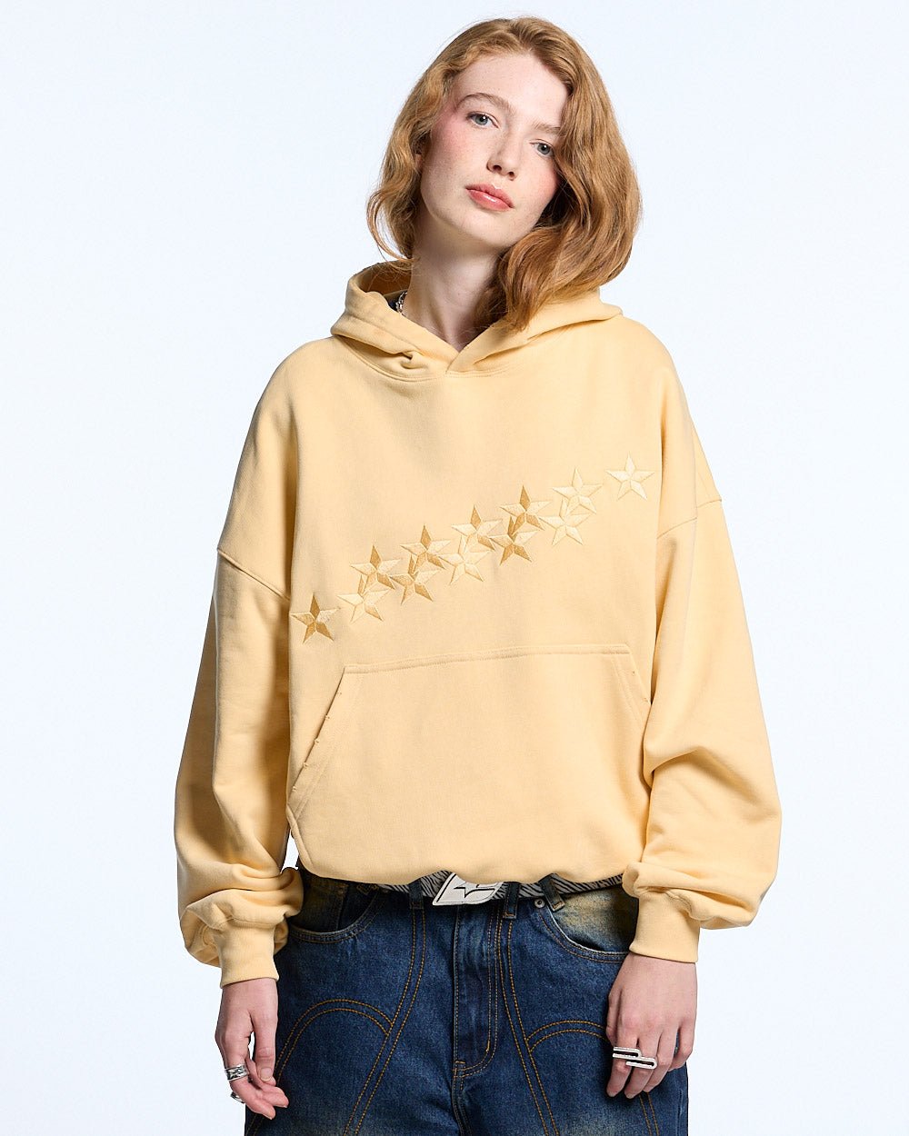 STARS HOODIE YELLOW - light yellow embroidered hoodie, front view on female model - Cold Culture #woman