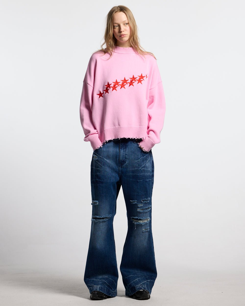 STARS KNIT PINK - pink star print knit sweater, front view on female model - Cold Culture #woman