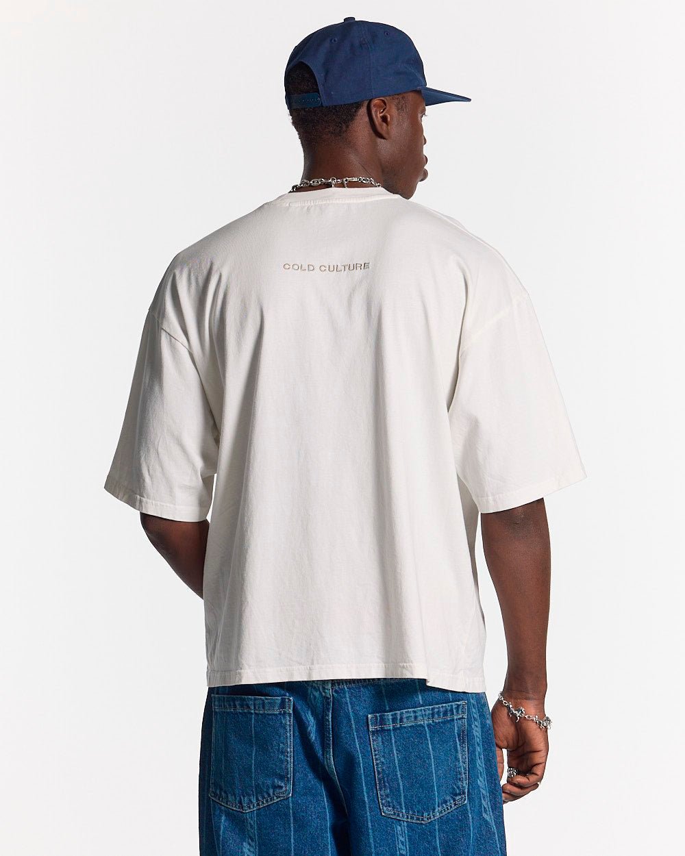 STARS TEE IVORY WHITE - ivory white oversized tee, back view on male model - Cold Culture #man