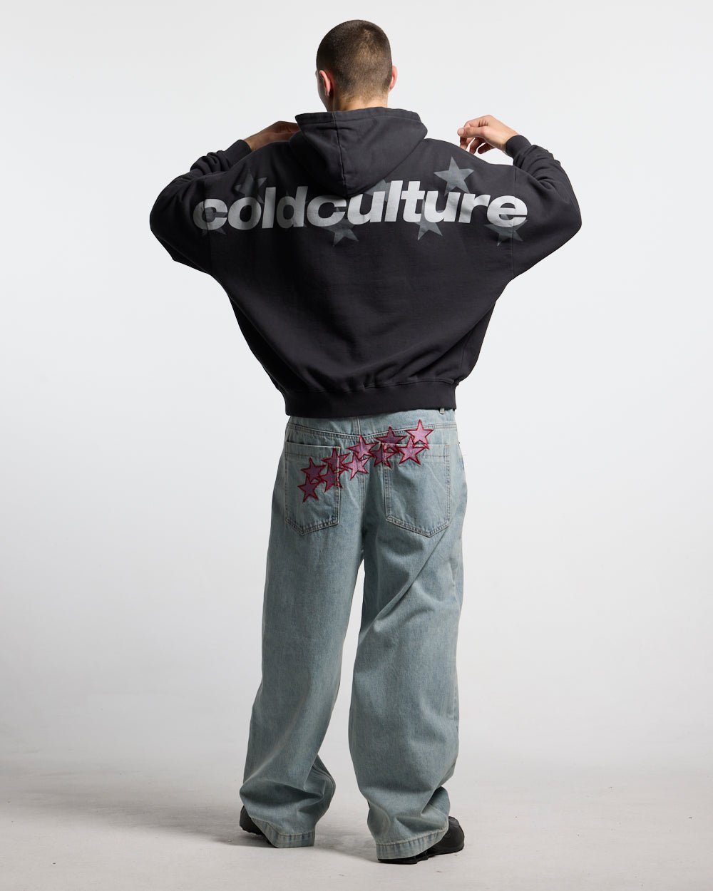 STARS V2 PANTS LIGHT BLUE DENIM - light blue baggy denim pants, back view on male model - Cold Culture #man