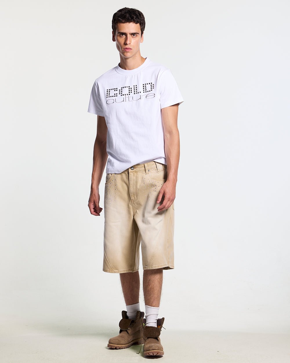 STARSTRUCK TEE WHITE - white studded logo tee, front view on male model - Cold Culture #man