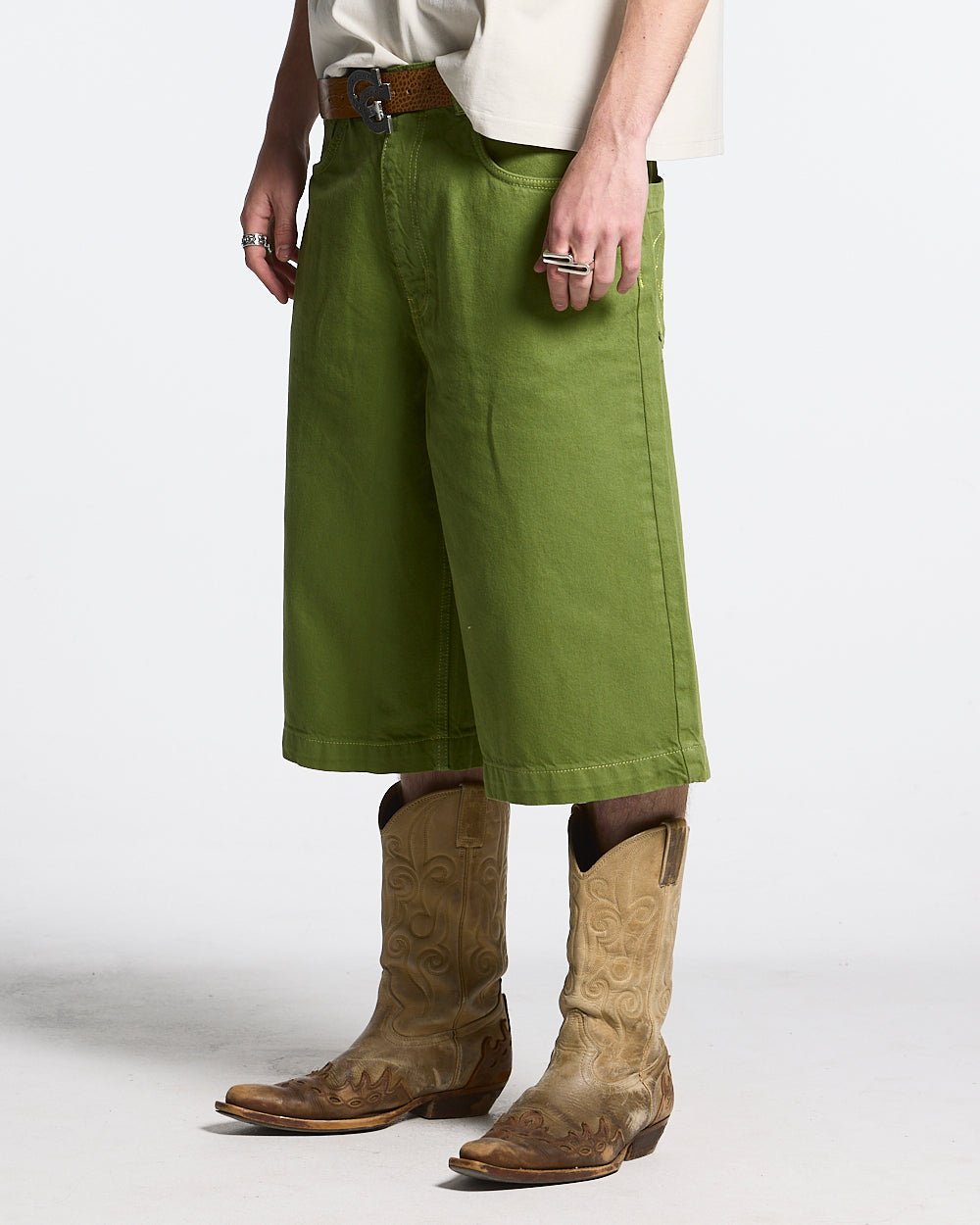 STITCHING JORTS CACTUS GREEN - green baggy denim shorts, front view on male model - Cold Culture