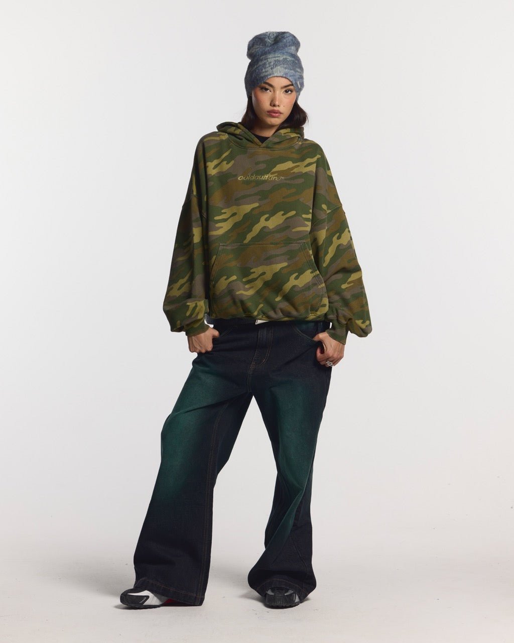 STRASS CAMO HOODIE - green camo hoodie, front view on female model - Cold Culture #woman