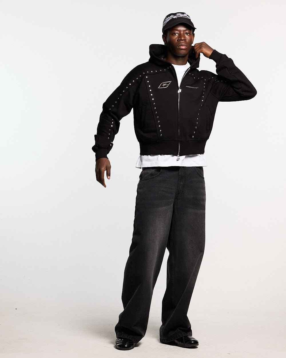 STUD ZIP HOODIE BLACK - black studded zip-up hoodie, front view on male model - Cold Culture #man