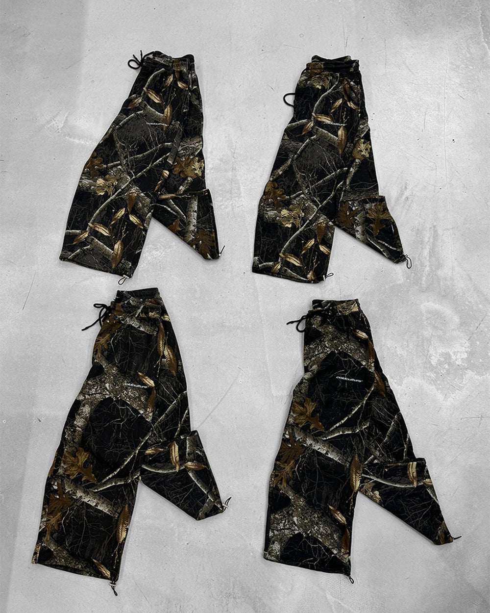 SWEATPANTS REALTREE BLACK - black camo sweatpants, flat lay - Cold Culture
