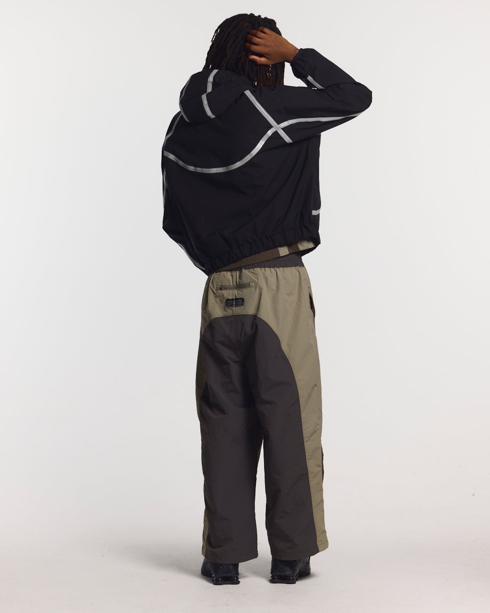 TAKE OFF LIGHTWEIGHT JACKET BLACK - black reflective trim jacket, back view on male model - Cold Culture #man