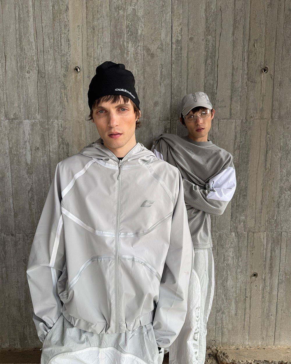 TAKE OFF LIGHTWEIGHT JACKET LIGHT GREY - light grey reflective trim jacket, street style shot - Cold Culture