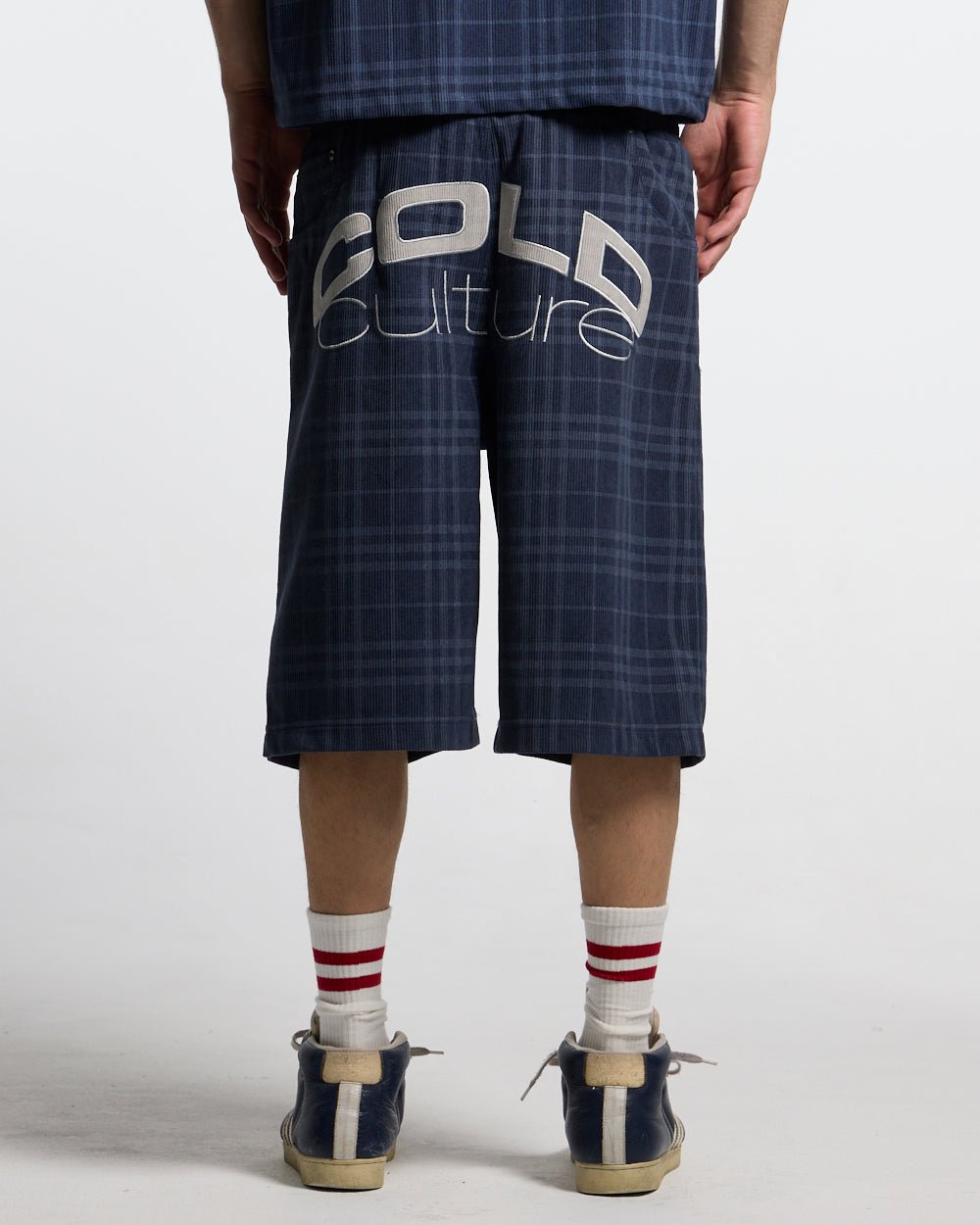 TARTAN CLUB SHORTS NAVY - navy check shorts, back view on male model - Cold Culture