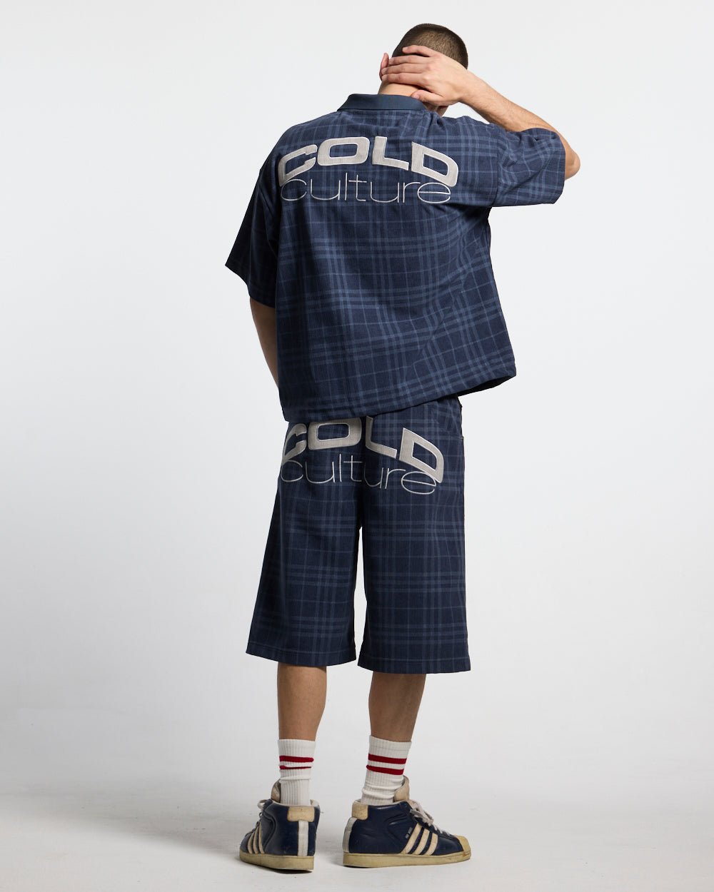 TARTAN CLUB SHORTS NAVY - navy check shorts, back view on male model - Cold Culture #man