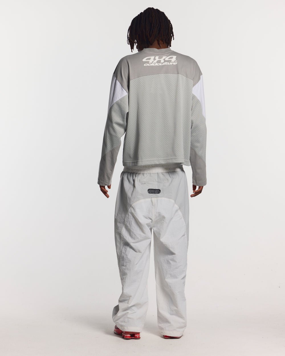 THUNDER LONGSLEEVE LIGHT GREY - light grey paneled longsleeve tee, back view on male model - Cold Culture #man