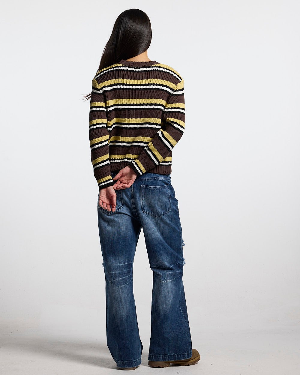 TIMELESS KNITWEAR BROWN - brown striped knit sweater, back view on female model - Cold Culture #woman